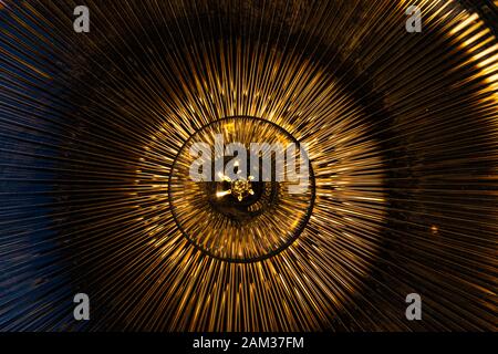 Inside of a filament lamp holder - Abstract electricity background concept Stock Photo