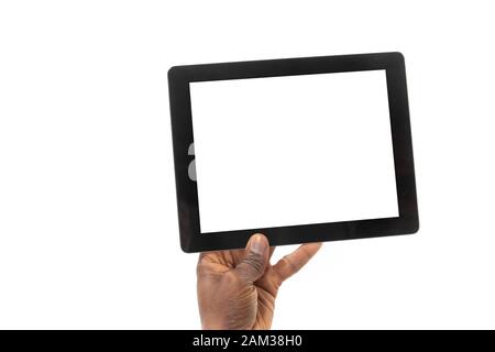 View from behind of an African man holding a tablet computer in one hand Stock Photo