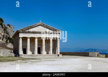 Ancient alike greek temple at Corfu island in Greece. Old Greek Bastion - corfu acropolis at day time. Stock Photo
