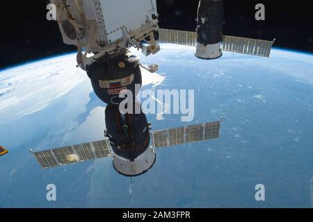 ISS - 13 Oct 2018 - Two Russian spacecraft, the Soyuz MS-09 crew ship (foreground) and the Progress 70 resupply ship, are pictured docked to the Inter Stock Photo