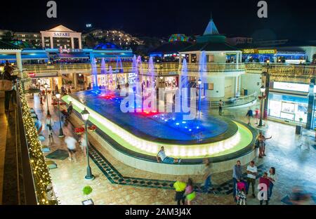 Music and fountain show in a shopping center at the Boulevard Avenida de las Americas in the popular city of Los Cristianos on Tenerife. Stock Photo