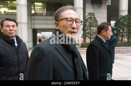 Lee Myung-Bak, Jan 8, 2020 : Lee Myung-Bak (C), South Korea's former President from 2008-2013, leaves after his trial at the Seoul High Court in Seoul, South Korea. South Korea's prosecution on January 8, 2020 requested that an appeals court sentence the former President Lee to 23 years in prison on bribery and embezzlement charges and demanded about 32 billion won (US$27.4 million) in fine and 16.3 billion won in forfeit for the ex-President. The requested sentencing by the prosecution is heavier than the 15-year jail term that a lower court handed down to Lee in October 2018, local media rep Stock Photo