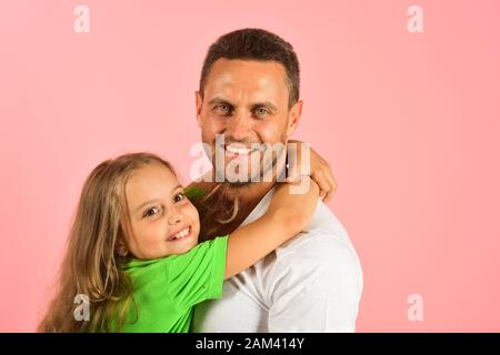Handsome father and his pretty daughter pose in the park Stock Photo |  Adobe Stock