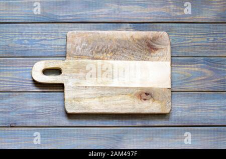 Empty cutting board on blue old boards abstract food old vintage background Stock Photo