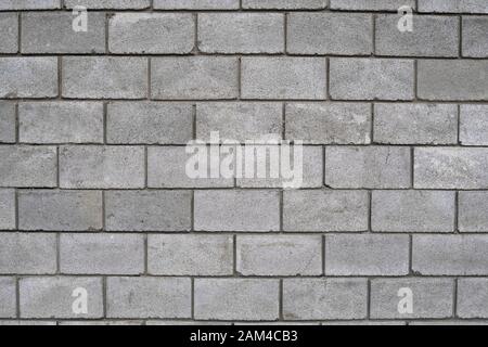 Lightweight concrete block foamed texture. Background texture of white Lightweight Concrete block, raw material for industrial or house wall. Stock Photo