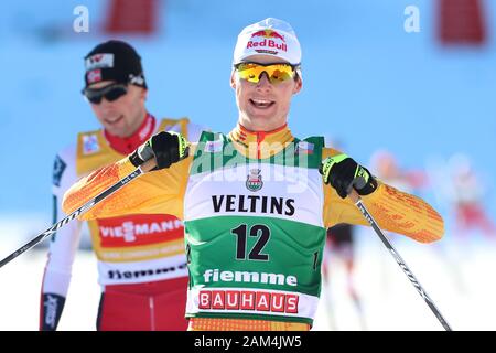 Trento, Italy. 11th January 2020; Lago Di Tesero, Val Di Fiemme, Trento, Italy; International Ski Federation World Cup, FIS Nordic Combined Val Di Fiemme, Vinzenz Geiger (GER) celebrates as he finishes - Editorial Use Credit: Action Plus Sports Images/Alamy Live News Stock Photo