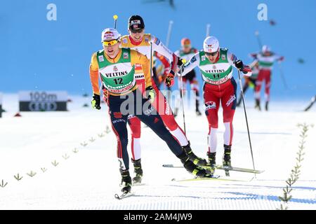 Trento, Italy. 11th January 2020; Lago Di Tesero, Val Di Fiemme, Trento, Italy; International Ski Federation World Cup, FIS Nordic Combined Val Di Fiemme, Vinzenz Geiger (GER) ahead of Jarl Magnus Riiber (NOR) and Joergen Graabak (NOR) - Editorial Use Credit: Action Plus Sports Images/Alamy Live News Stock Photo