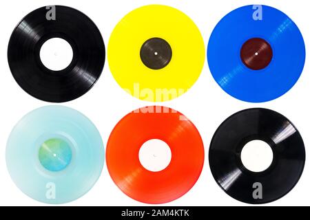 Collection of various color vinyl records with paper labels isolated on white background. Stock Photo