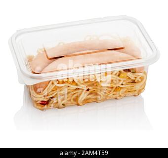 boiled sausages with macaroni in a transparent plastic container for food Stock Photo