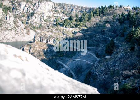 Blue Lake in Imotski, Croatia. Like the nearby Red Lake, it lies in a deep sinkhole formed by the collapse of an enormous cave. Stairs leading to the Stock Photo