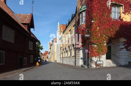VISBY, SWEDEN ON OCTOBER 11, 2019. Street view of buildings during the autumn. Old house, homes in the town. Editorial use. Stock Photo