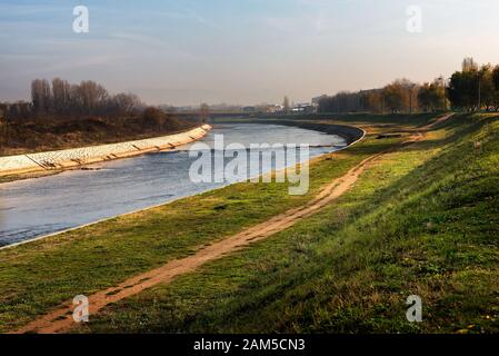 Nisava River on the outskirts of the City of Nis in Serbia, with walking and jogging paths and parks. Stock Photo