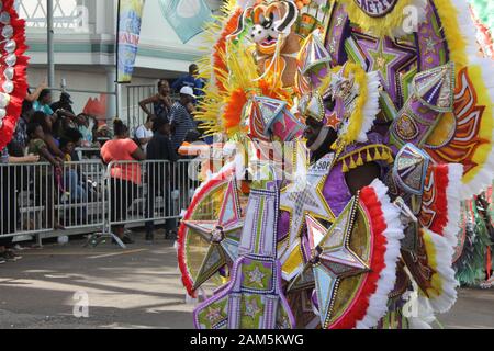 Man in giant costume at the Junkanoo festival celebration on Boxing Day in Nassau, the Bahamas Stock Photo
