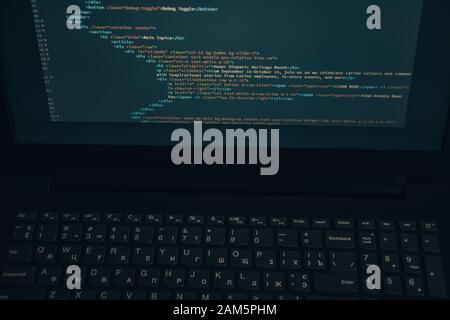 Close up css HTML code on monitor screen with black background Stock Photo