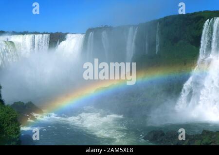 Stunning view of Brazilian side Iguazu falls with a gorgeous rainbow, Foz do Iguacu, Brazil, South America Stock Photo
