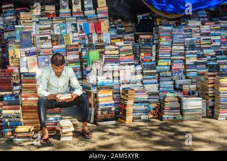 Books for sale at street side market stall near Flora Fountain in Mumbai. India Stock Photo