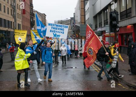 Glasgow, UK. 11th Jan, 2020. Around 100,000 demonstrators taking part in the “All Under One Banner” pro-independence march in Glasgow to demand a second independence referendum in Scotland. Credit: Richard Gass/Alamy Live News Stock Photo