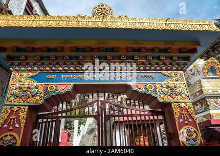 Entrance gate to Buddhist monastery in Marpha, a small village in Mustang district, Nepal Stock Photo