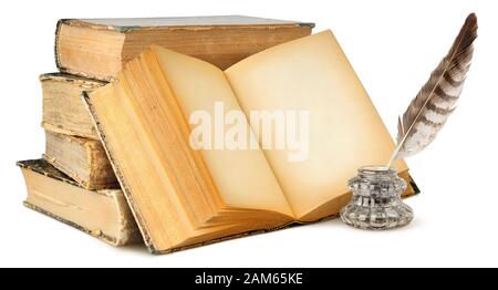 Isolated books with empty pages. Open blank book, stack of vintage books and ink bottle with quill isolated on white background with clipping path Stock Photo