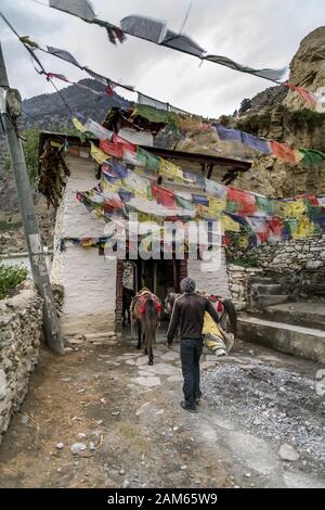 Noirthern entrance gate to Marpha, small village in Mustang district, Nepal Stock Photo