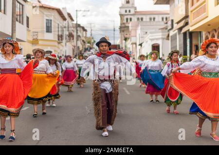 Participants in a new year street festival in Riobamba, Ecuador. Stock Photo