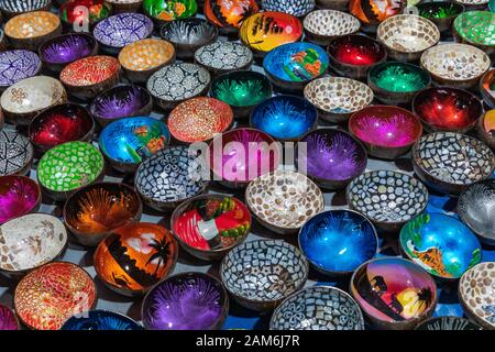 Souvenir colourfully lacquer bowls on the market at Luang Prabang in Laos. Homemade artworks by local people. Stock Photo