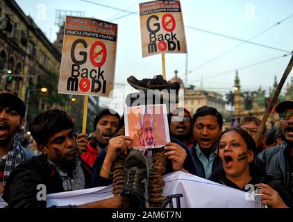 Kolkata, India. 11th Jan, 2019. Protesters hold placards while chanting slogans during the demonstration.Demonstration against the visit of India's Prime Minister Narendra Modi and also against (Citizenship Amendment Bill) or CAB which grants Indian citizenship to non-Muslims of Afghanistan, Pakistan and Bangladesh that was passed by the Indian Government in December 2019 and has created violence, strike and protest all over the India. Credit: Avishek Das/SOPA Images/ZUMA Wire/Alamy Live News Stock Photo