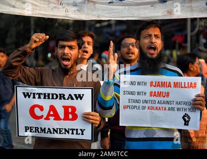 Kolkata, India. 11th Jan, 2019. Protesters hold placards while chanting slogans during the demonstration.Demonstration against the visit of India's Prime Minister Narendra Modi and also against (Citizenship Amendment Bill) or CAB which grants Indian citizenship to non-Muslims of Afghanistan, Pakistan and Bangladesh that was passed by the Indian Government in December 2019 and has created violence, strike and protest all over the India. Credit: Avishek Das/SOPA Images/ZUMA Wire/Alamy Live News Stock Photo