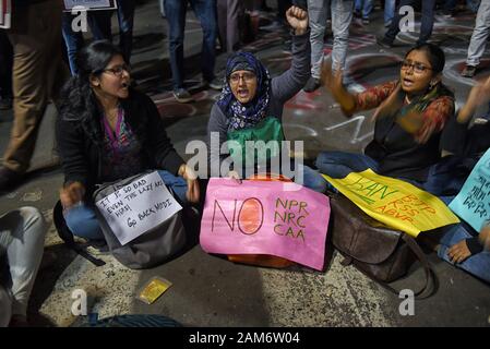 Kolkata, India. 11th Jan, 2019. Protesters hold placards while chanting slogans during the demonstration.Demonstration against the visit of India's Prime Minister Narendra Modi and also against (Citizenship Amendment Bill) or CAB which grants Indian citizenship to non-Muslims of Afghanistan, Pakistan and Bangladesh that was passed by the Indian Government in December 2019 and has created violence, strike and protest all over the India. Credit: Avishek Das/SOPA Images/ZUMA Wire/Alamy Live News Stock Photo