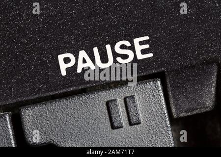 Macro close up photograph of vintage tape machine play and record pause button. Stock Photo
