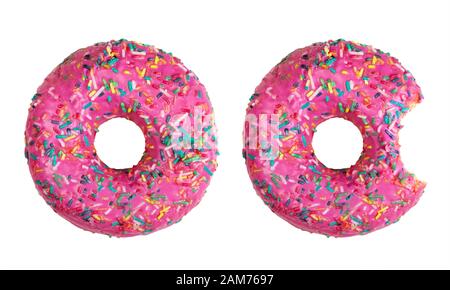 Two donuts decorated with colorful sprinkles isolated on white background. Flat lay. Stock Photo