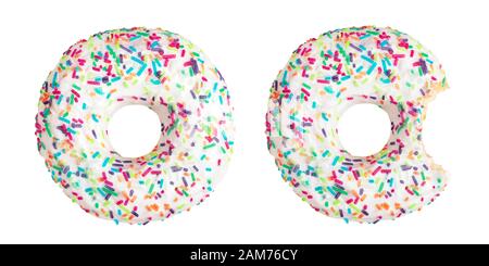 White donuts whole and bitten donuts decorated with colorful sprinkles isolated on white background Stock Photo