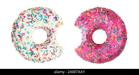 Set of two bitten donuts decorated with colorful sprinkles isolated on white Stock Photo