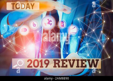 Word writing text 2019 Review. Business photo showcasing New trends and prospects in tourism or services for 2019 Picture photo system network scheme Stock Photo