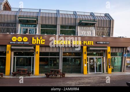 Jeju, Korea, 6th, March, 2019. BHC Chicken restaurant, or “Better & Happier Choice” is one of most popular Korean Fried Chicken chains, having opened Stock Photo