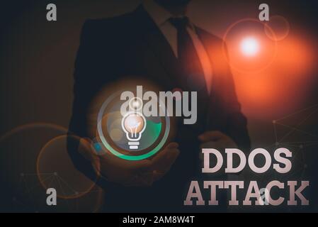 Handwriting text writing Ddos Attack. Conceptual photo perpetrator seeks to make a network resource unavailable to user Stock Photo