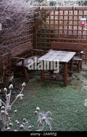 garden gazebo covered with the first light snow Stock Photo