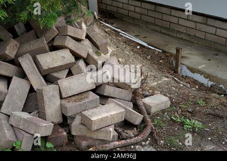 renovation in the garden - a pile of bricks Stock Photo
