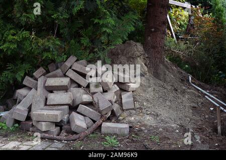 renovation in the garden - a pile of bricks Stock Photo
