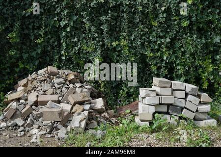 renovation in the garden - a pile of bricks Stock Photo