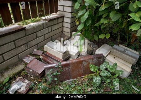 pile of bricks in the garden - demolition before renovation Stock Photo