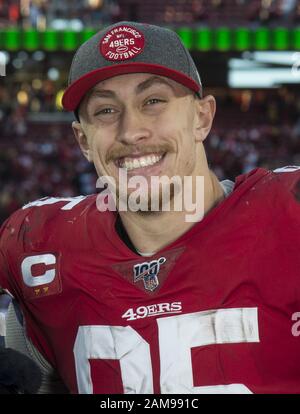 San Francisco 49ers defensive end Dee Ford (55) salutes the fans during an  NFL divisional playoff game against the Minnesota Vikings, Saturday, Jan. 11,  2020, in Santa Clara, Calif. The 49ers defeated