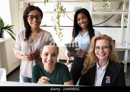Group of diverse businesswomen negotiating distantly webcamera view Stock Photo