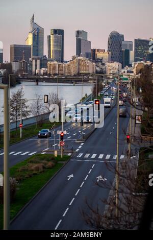 Morning activity at sunrise in the financial district of Paris Stock Photo