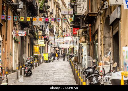 NAPLES, ITALY - JANUARY 4, 2020: tourists visiting Spanish Quarters Stock Photo