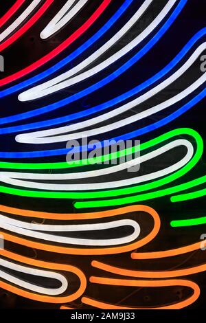 Colorful fluorescent light neon on black background Stock Photo