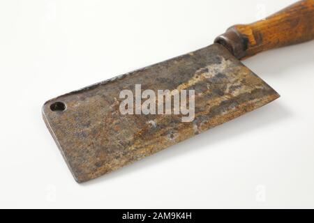 Old rusty chopping knife with wooden handle Stock Photo
