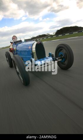 Bugatti Type 35 vintage race car driving on Silverstone race track Northants UK Stock Photo