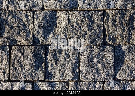 Paving stone vintage road cover close-up. Stock Photo