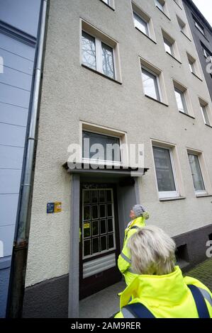 Dortmund, Germany. 12th Jan, 2020. Employees of the public order office check whether houses in the city centre have been abandoned by the residents. Because of the suspicion of four aerial bombs from the Second World War thousands of people have to leave the danger zone. If the suspicions are confirmed, the bombs are to be defused today. Credit: Henning Kaiser/dpa/Alamy Live News Stock Photo